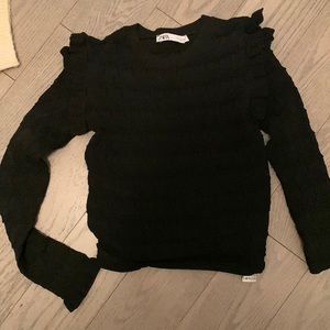 Black. Size small. Black knit sweater.